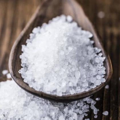 MSM crystals on  a wooden spoon